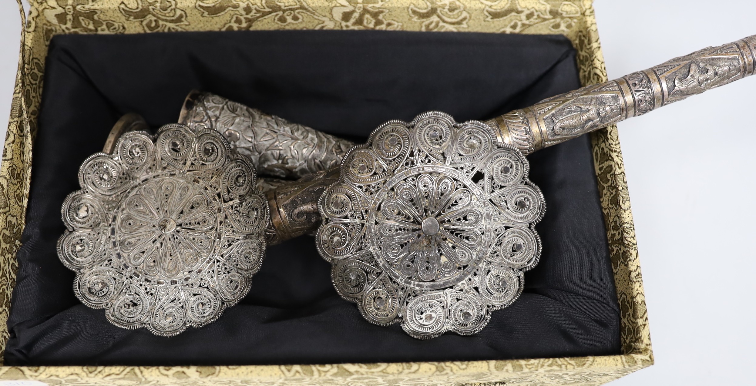 A Burmese white metal parasol handle, 33.2cm, a pair of Indian white metal spill vases and a pair of filigree dishes.